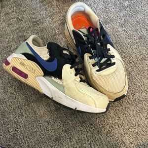 Nike Sneakers with Cream and Orange Accents